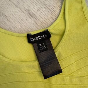 Bebe stretchy mini dress, black and neon green. Size small